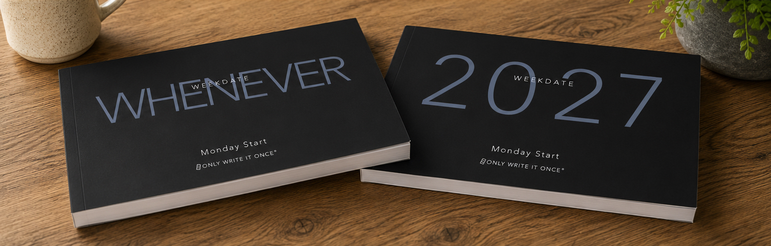WeekDate paper planners on a desk — Whenever and 2027 weekly planners